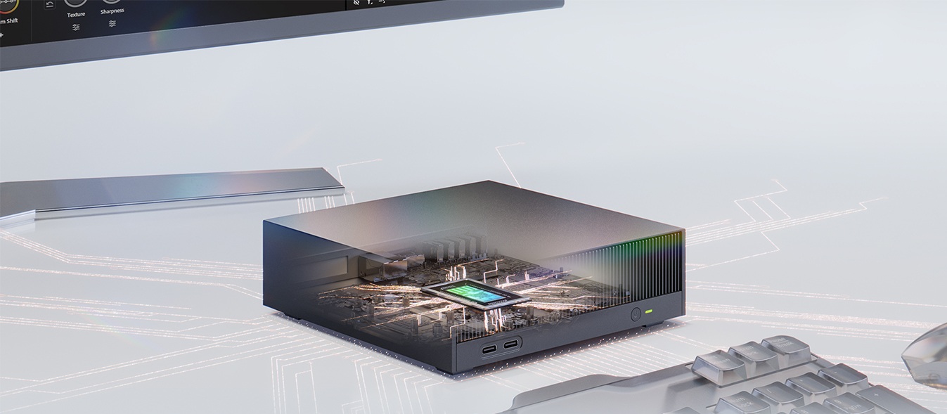 Compact mini PC with a semi-transparent top showing internal components