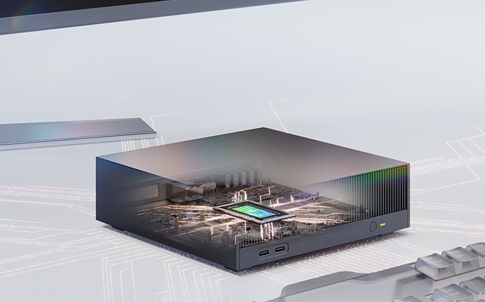 Compact mini PC with a semi-transparent top showing internal components