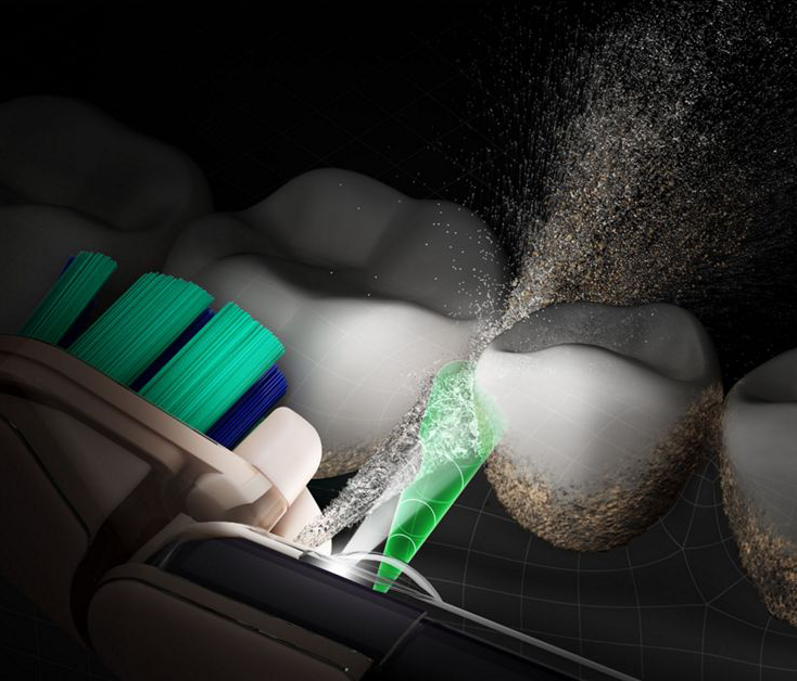 Dyson CameraJet toothbrush flosses with liquid between teeth.